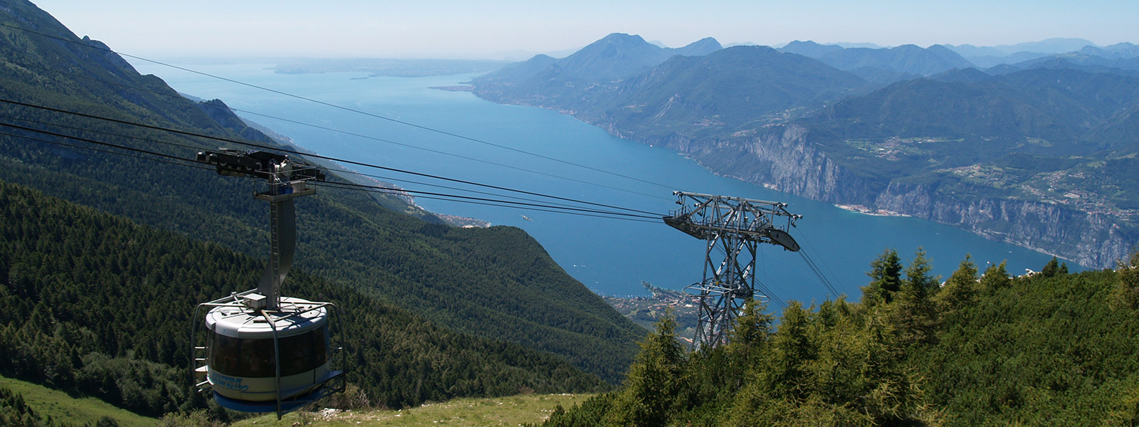 The cable car Funivia Malcesine – Monte Baldo, source Panoramio - Author:  Hans Hagenaars -  cutted from the original
